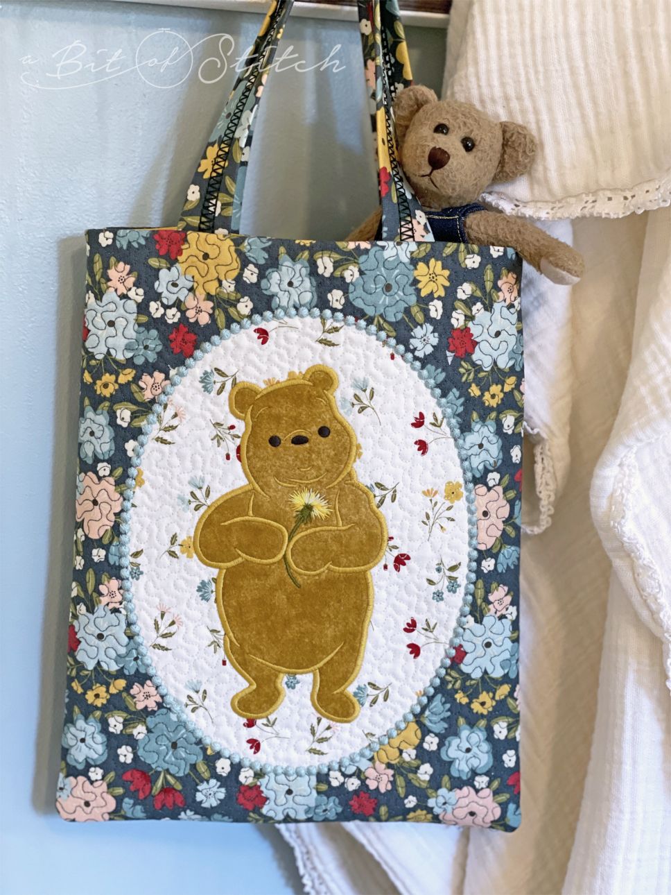 Framed Winnie the Pooh applique on tote bag - machine embroidery designs from A Bit of Stitch