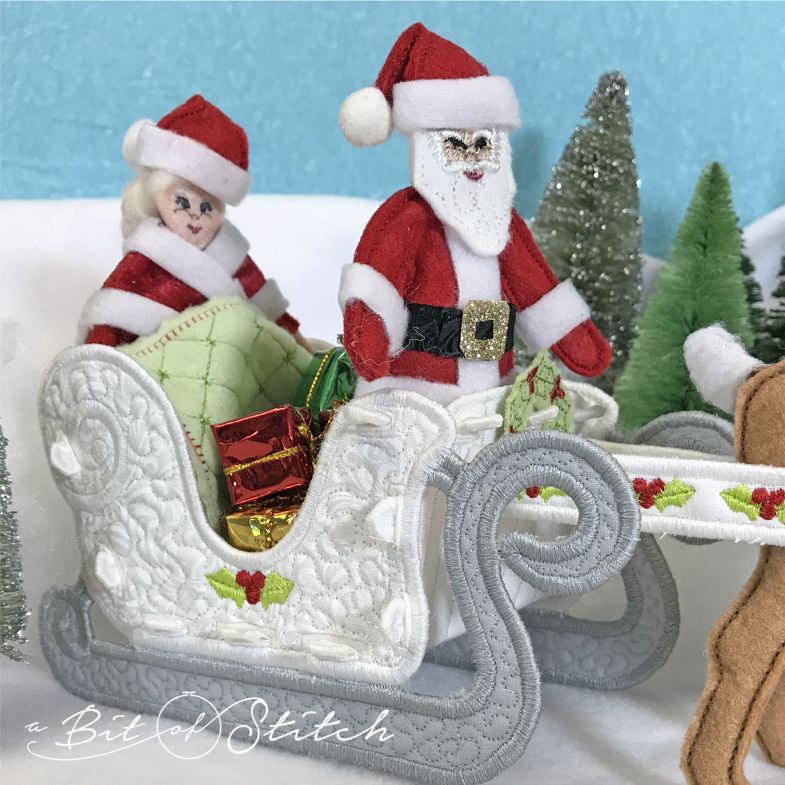 Mrs. Claus and Santa in sleigh doll designs
