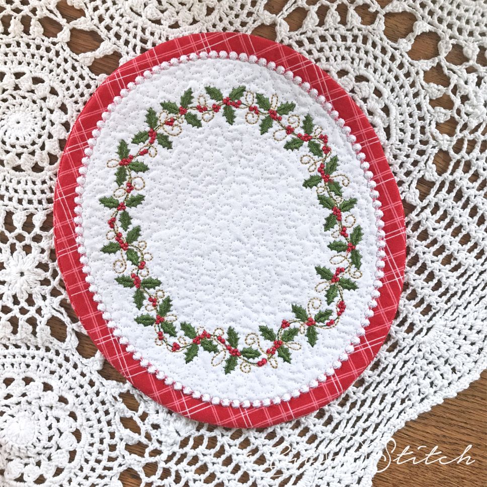 A Bit of Stitch embroidery design Holly Vines oval frame border on Dainty Doilies