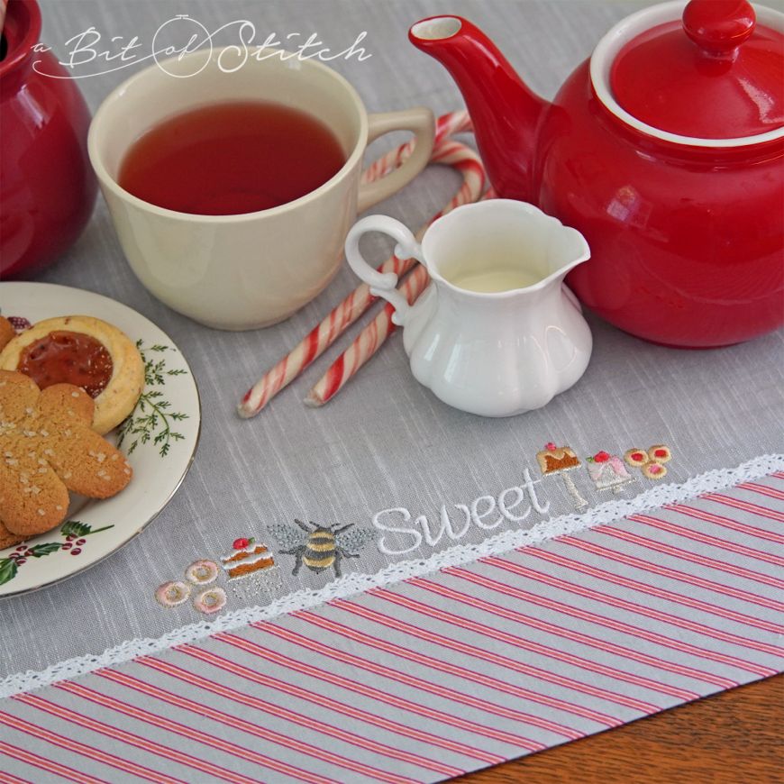 banded tea towel with bee sweet embroidery