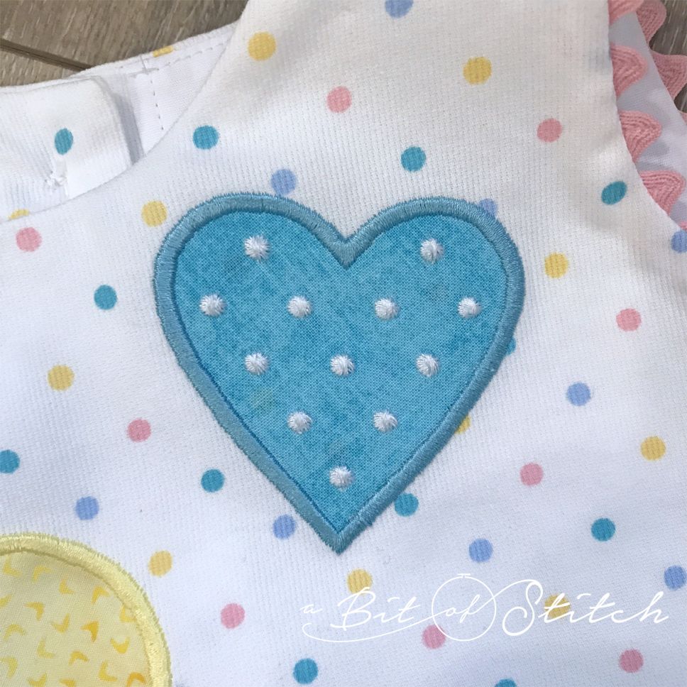 tiny polka dot heart applique design by A Bit of Stitch