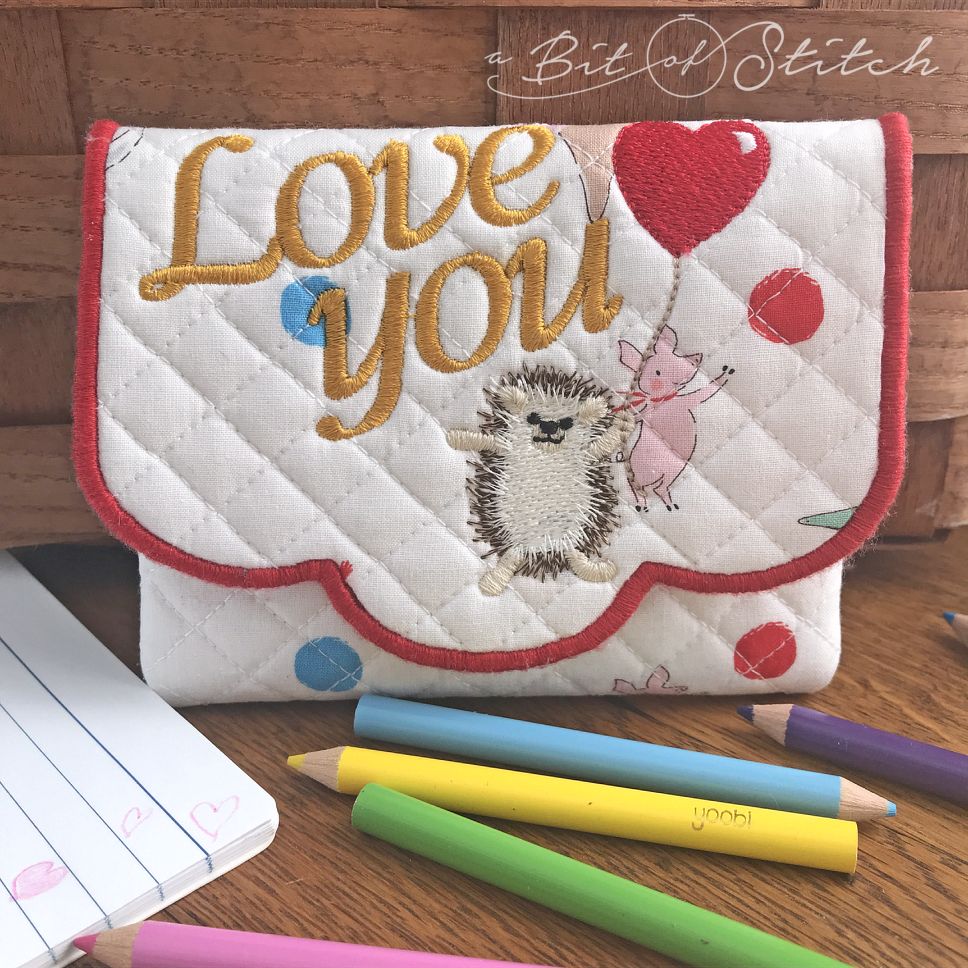ITH purse pouch with hedgehog and heart balloon machine embroidery designs by A Bit of Stitch
