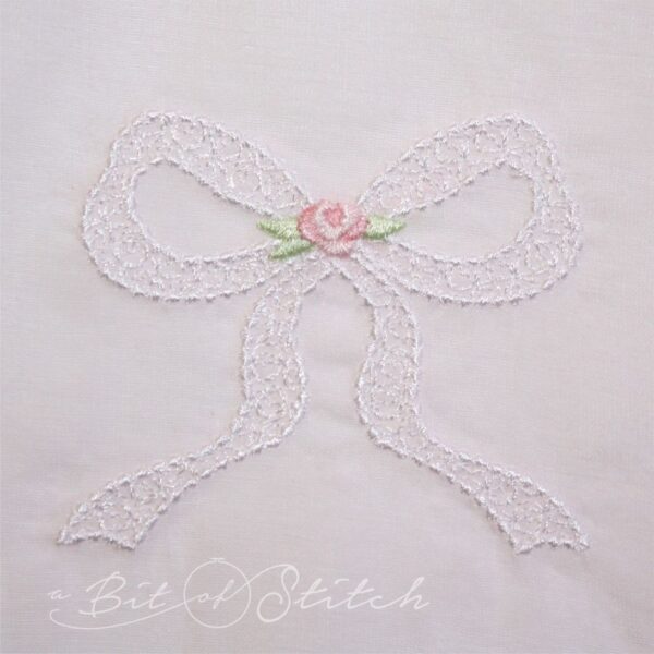 Lace bow machine embroidery design by A Bit of Stitch