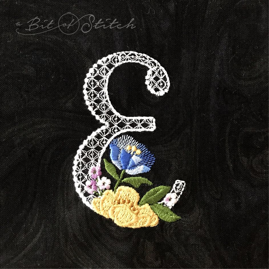 Fiori Script letter E monogram - elegant lacy floral script machine embroidery design by A Bit of Stitch