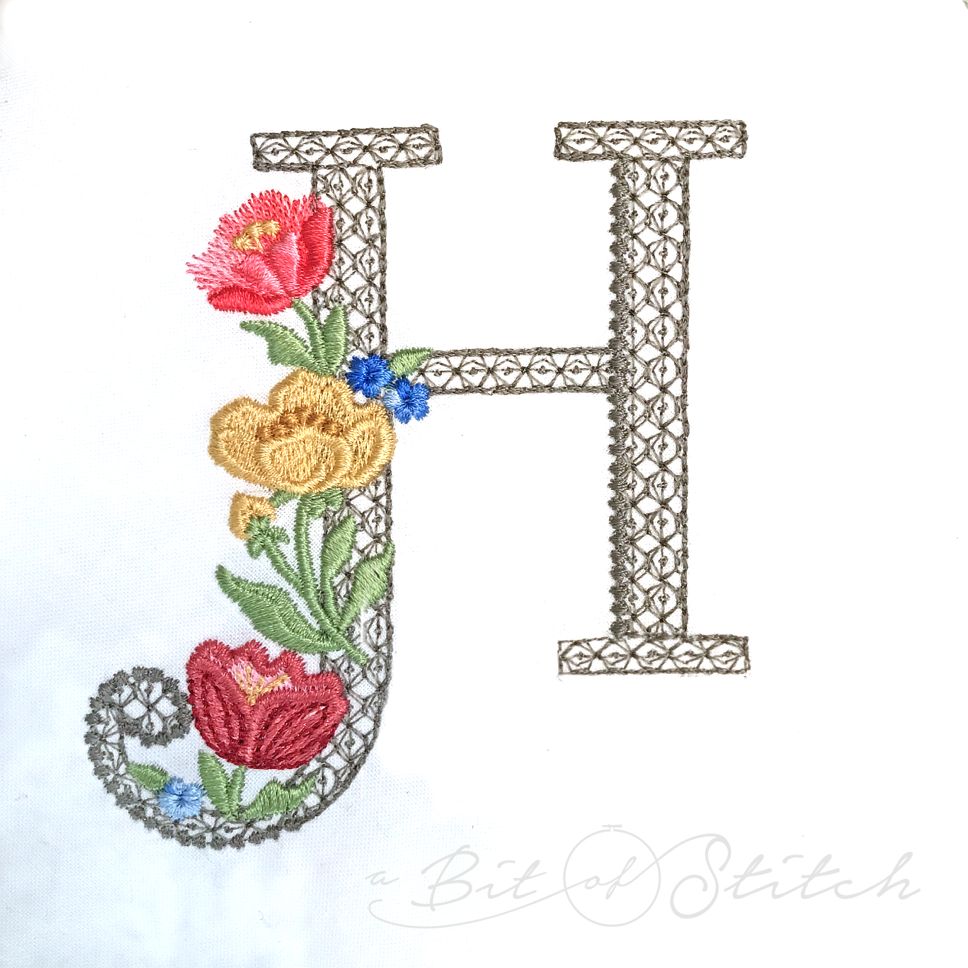 Fiori Script letter H monogram - elegant lacy floral script machine embroidery design by A Bit of Stitch