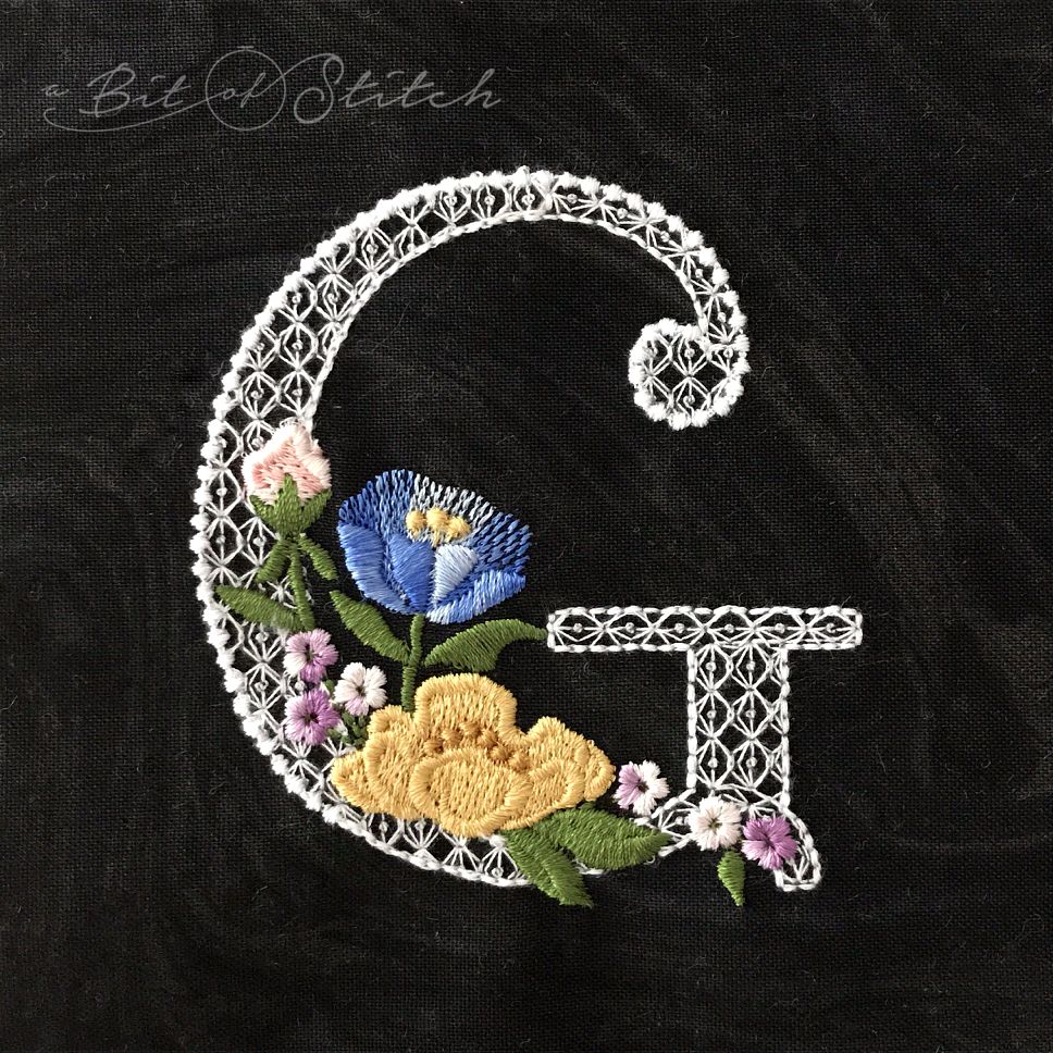 Fiori Script letter G monogram - elegant lacy floral script machine embroidery design by A Bit of Stitch