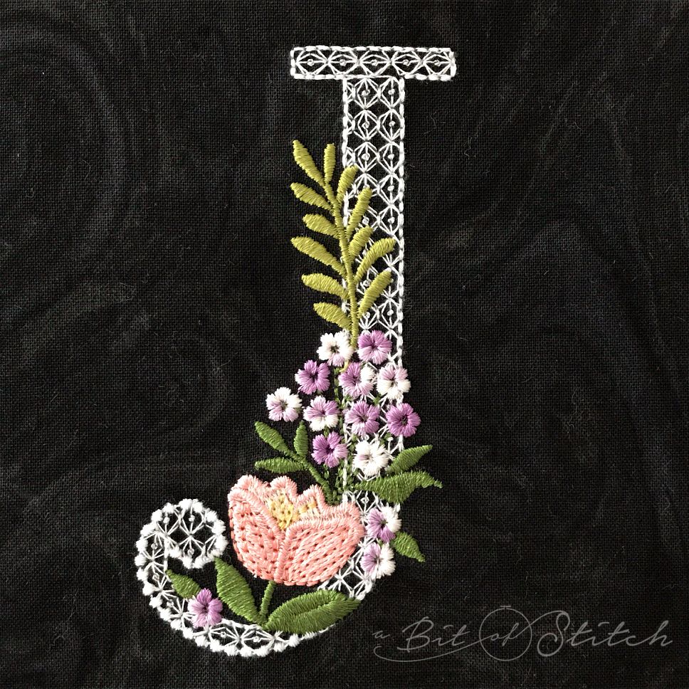 Fiori Script letter J monogram - elegant lacy floral script machine embroidery design by A Bit of Stitch