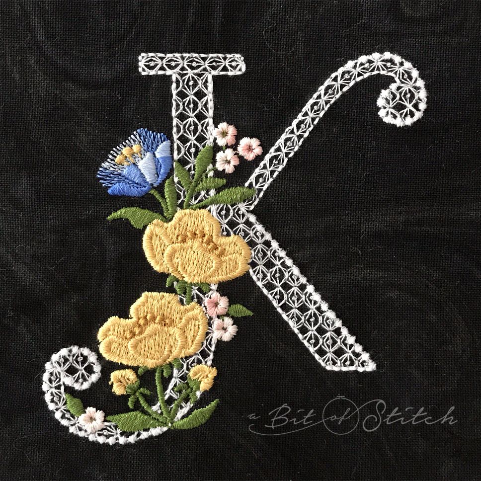 Fiori Script letter K monogram - elegant lacy floral script machine embroidery design by A Bit of Stitch