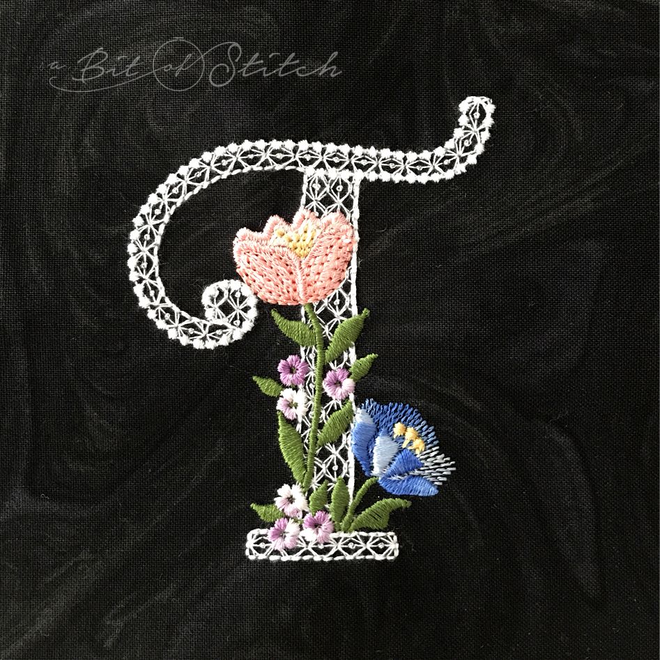 Fiori Script letter T monogram - elegant lacy floral script machine embroidery design by A Bit of Stitch