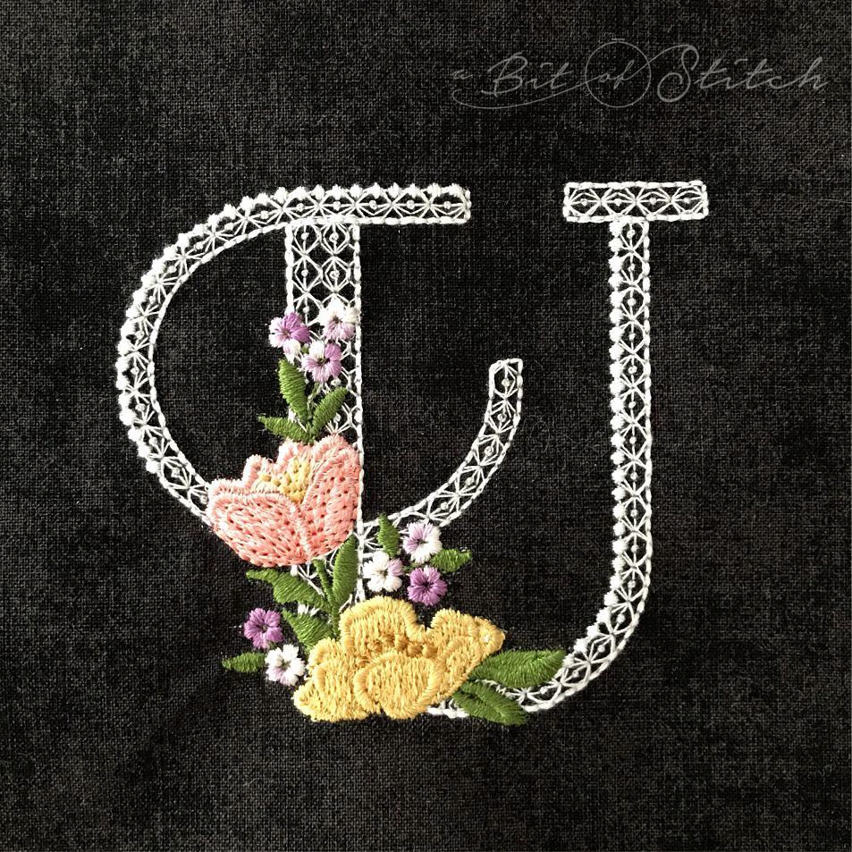 Fiori Script letter U monogram - elegant lacy floral script machine embroidery design by A Bit of Stitch