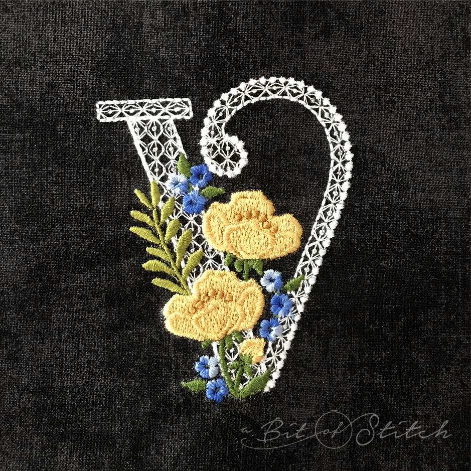 Fiori Script letter V monogram - elegant lacy floral script machine embroidery design by A Bit of Stitch
