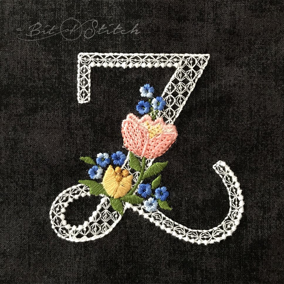 Fiori Script letter Z monogram - elegant lacy floral script machine embroidery design by A Bit of Stitch