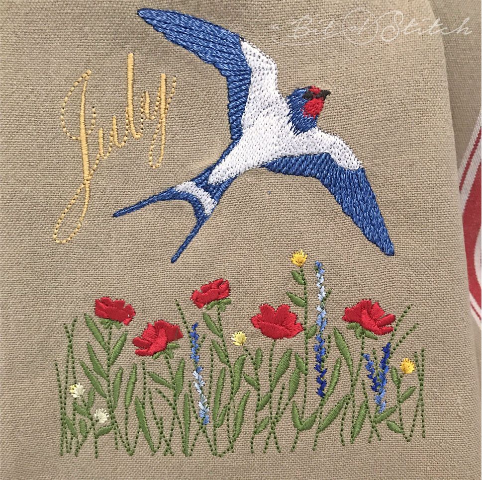Barn swallow machine embroidery design by A Bit of Stitch - red, white and blue bird