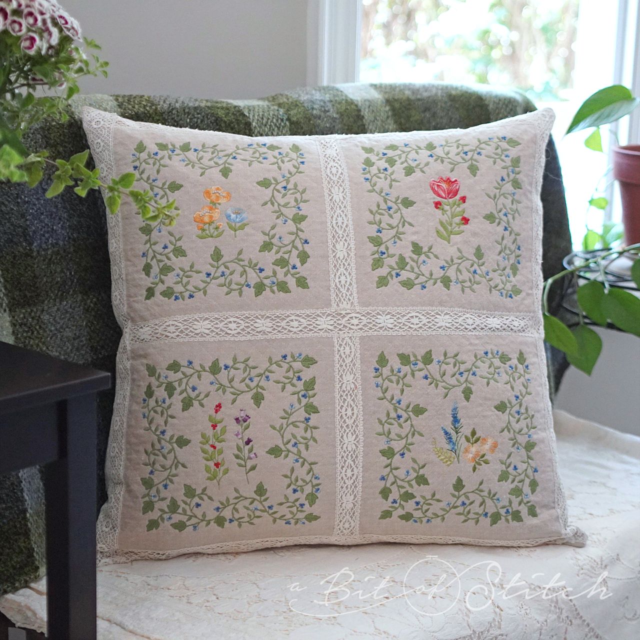 Pillow with vine berry square frames machine embroidery designs by A Bit of Stitch from Fancy Frames design collection