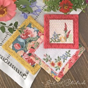 Vintage style square fabric doilies made in the hoop from machine embroidery designs by A Bit of Stitch