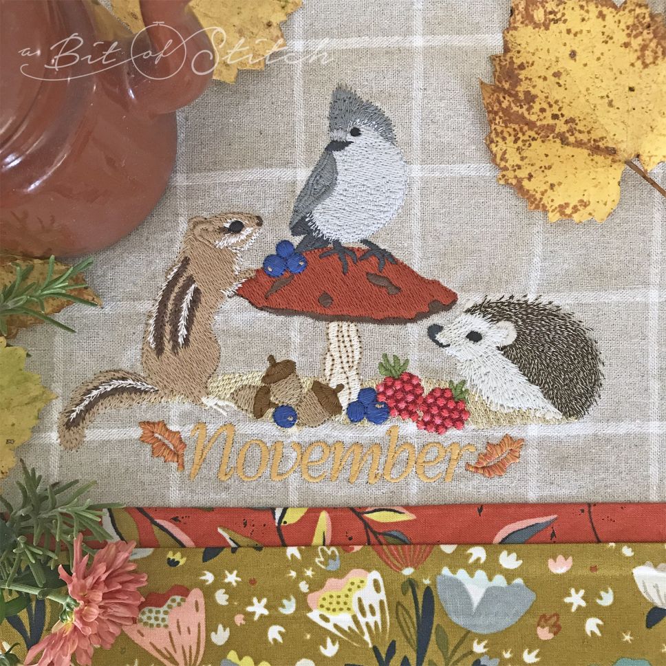 November Feast chipmunk, titmouse bird, and hedgehog gather around mushroom - machine embroidery design by A Bit of Stitch