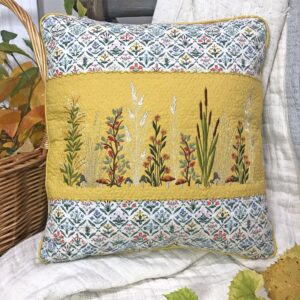 Fall Fields autumn floral machine embroidery designs by A Bit of Stitch on throw pillow