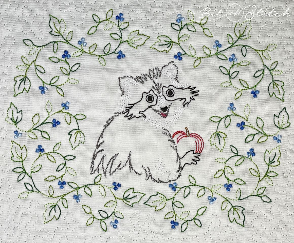 Raccoon framed by vine wreath - machine embroidery designs from A Bit of Stitch