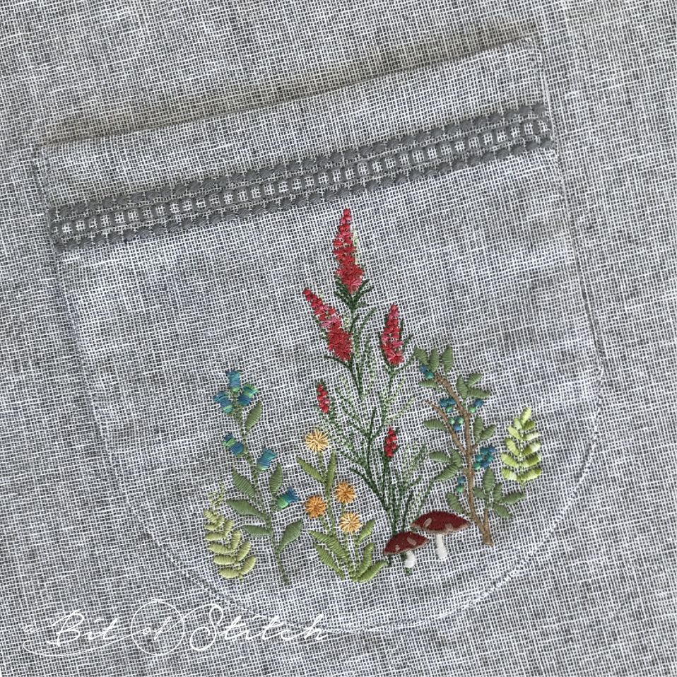 Made in the hoop pocket with delicate beaded band and woodland floral embroidery - Pretty Pockets machine embroidery designs from A Bit of Stitch