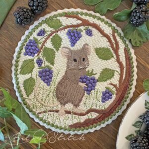 Realistic field mouse embroidery with woodland berry background - Munchkin Mouse machine embroidery design from A Bit of Stitch