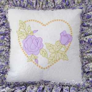 Ruffled throw pillow with delicate lacy rose heart raw edge applique machine embroidery design from A Bit of Stitch