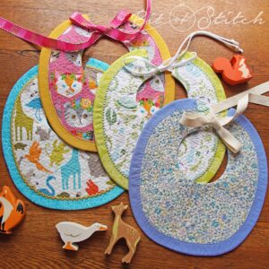 Made in the hoop quilted baby bibs - Bonny Bibs machine embroidery designs from A Bit of Stitch